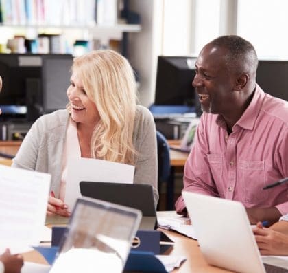 Work group collaboration around conference table